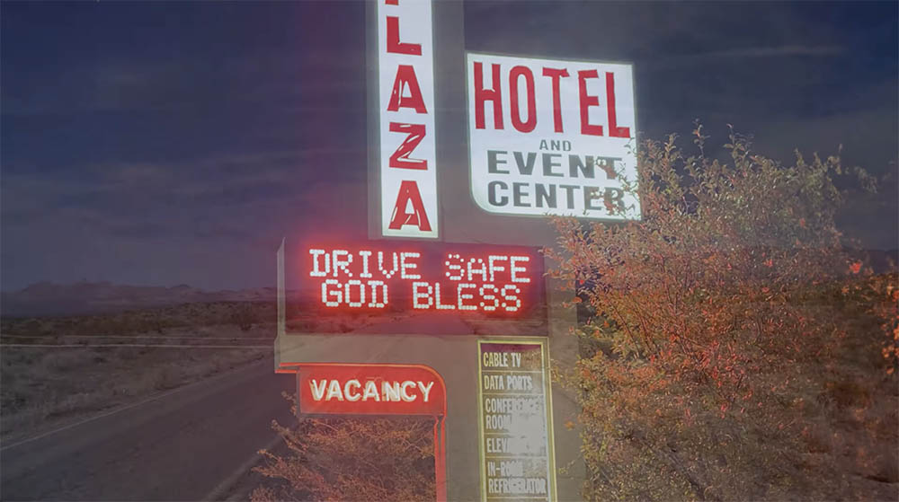 Montage of glowing hotel signs with US Highway 50